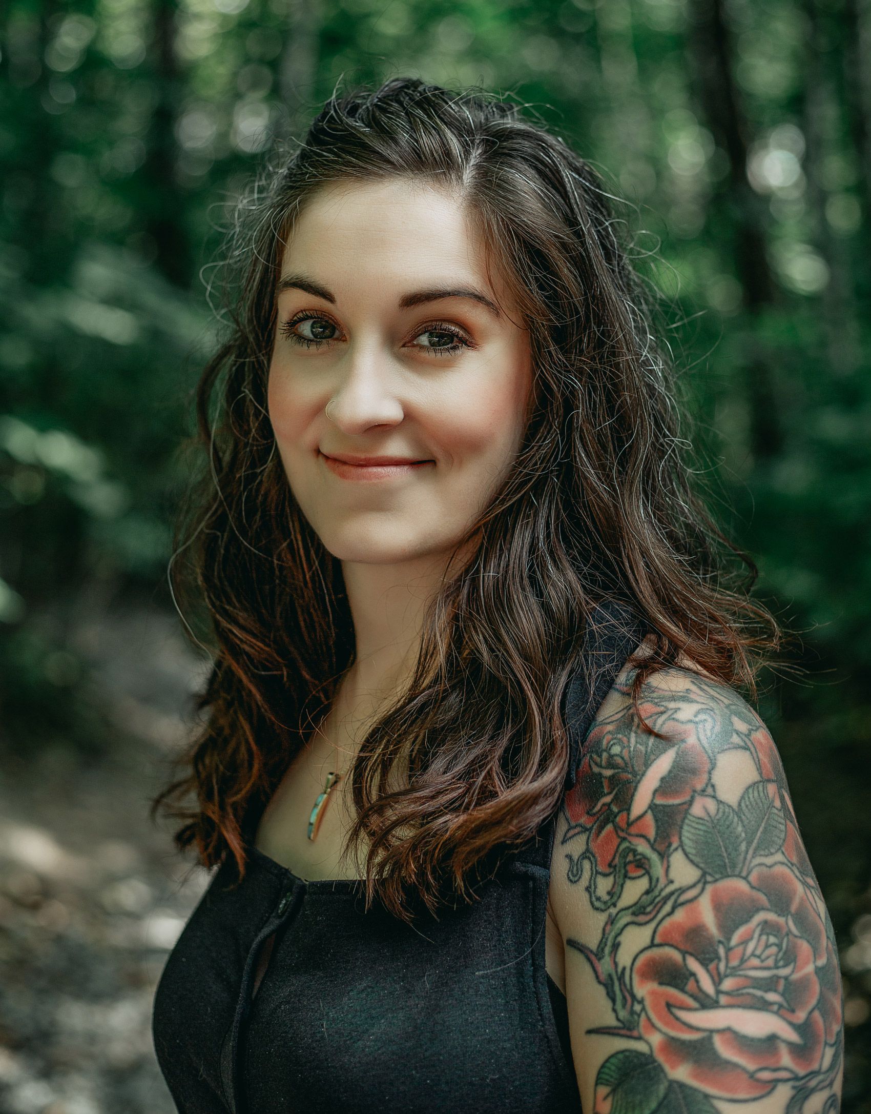 Headshot of Sarah Kvist in the forest in Squamish, B.C.